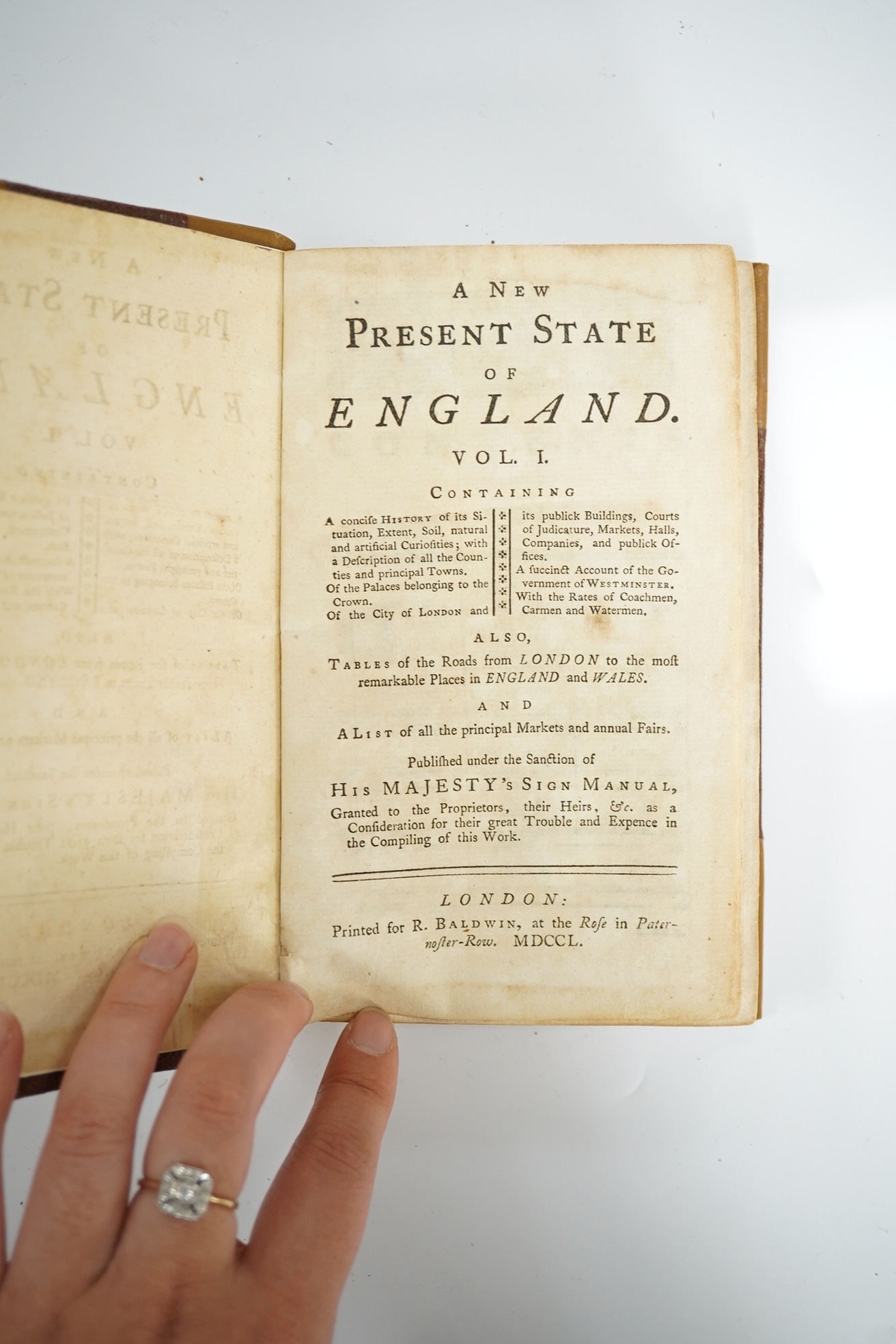 The Traveller's Pocket Book: or, Ogilby and Morgan's Book of Roads improved and amended ... the second edition, corrected. folded map (pictorial engraved title and a reference key with cartouche surround); newly rebound